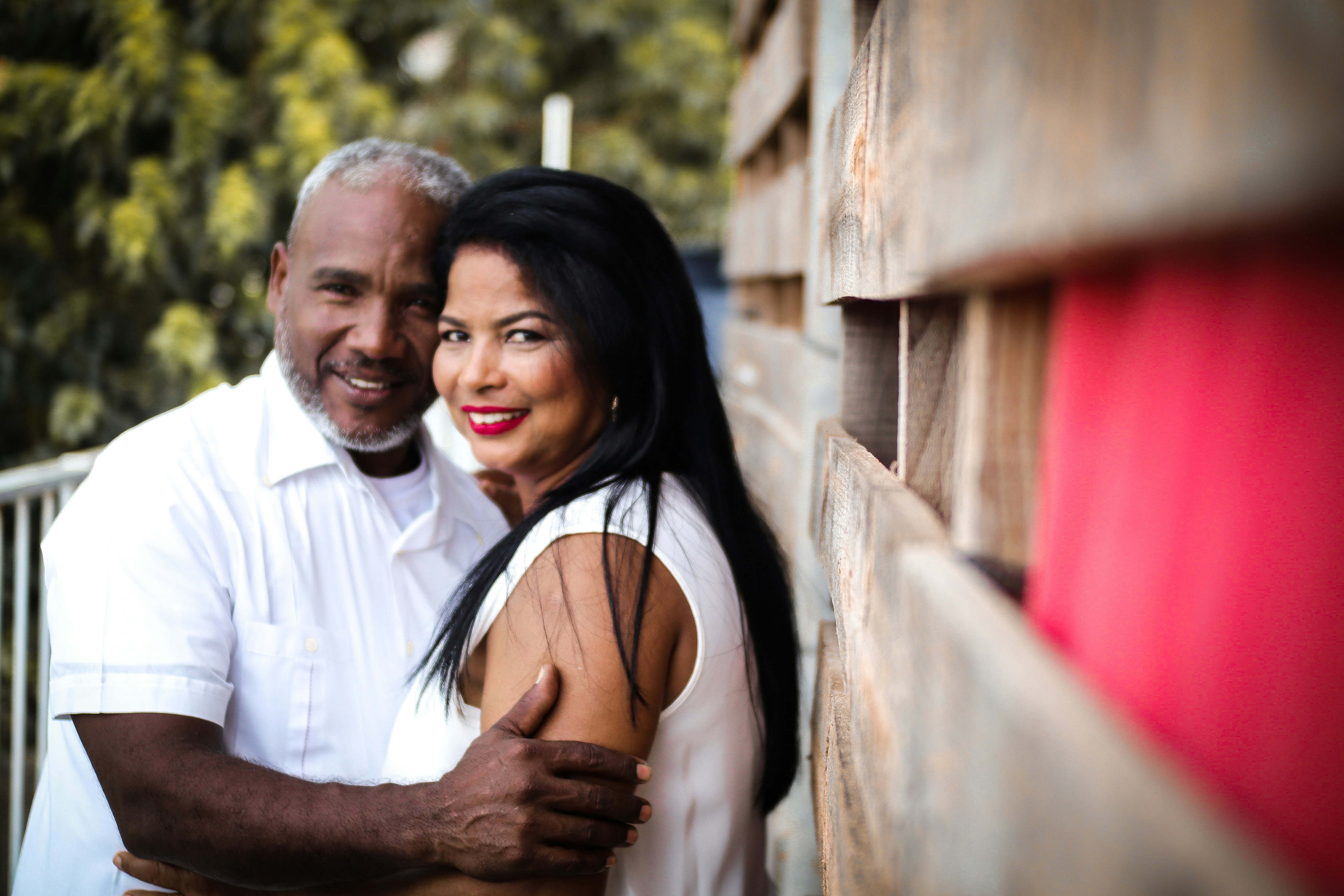 multicultural couple embraces
